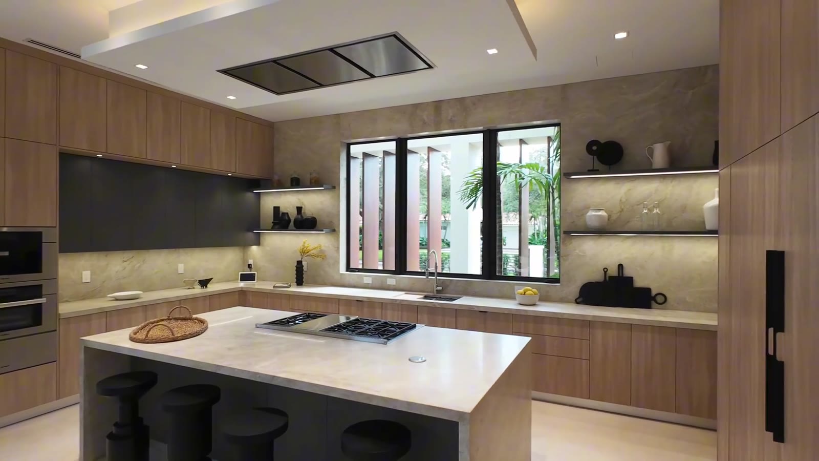 Kitchen with stone island and oak cabinetry