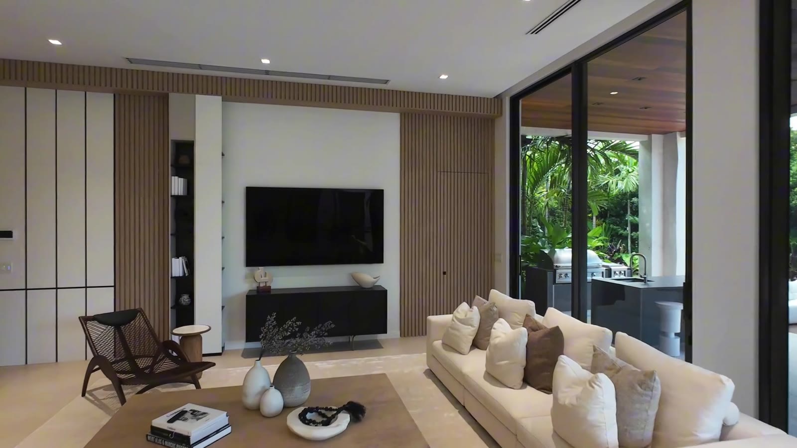 Bright living room with floor-to-ceiling windows